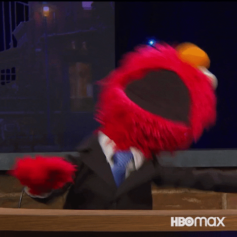 Animated meme of an excited red Muppet celebrating