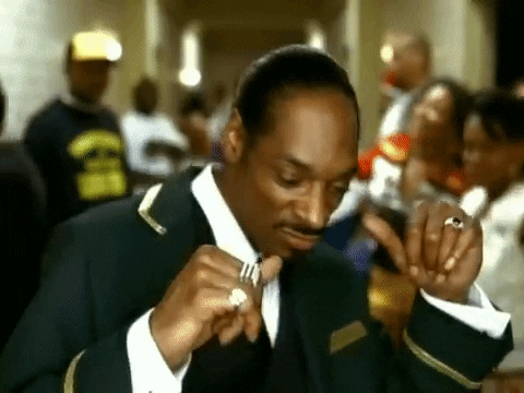 Snoop Dogg dancing in a suit celebration meme