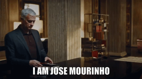 Man in a suit declaring I am Jose Mourinho, a confident reaction GIF