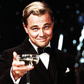 Leonardo DiCaprio raising a glass in a congratulatory toast meme